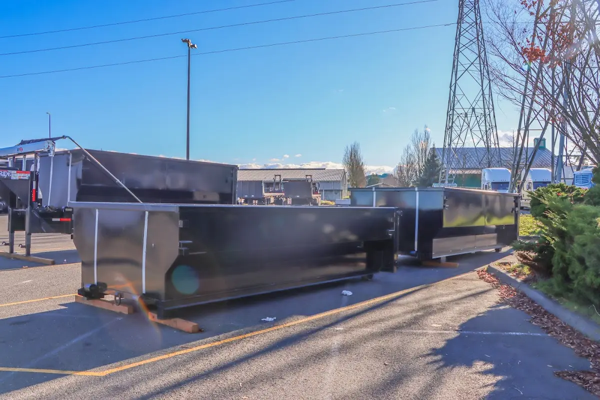 Roll-off dumpster ready for waste disposal at job site for 3 Yard Dumpster Rental in Springdale